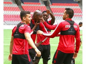 Cavalry FC (L-R) Carlos Patino, Jordan Brown, Nathan Mavila and Jose Escalante share a laugh during practice at BC Place in Vancouver, BC on Tuesday, July 23, 2019. Cavalry FC play Vancouver Whitecaps in the second leg of the third round of the 2019 Canadian Championships on Wednesday night. Jim Wells/Postmedia
