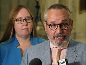 David Harrigan (right, Director of Labour Relations, United Nurses of Alberta) and Alberta NDP MLA Christina Gray (left, NDP Opposition Critic for Labour) comment on the Bill 9 injunction at the Alberta Legislature on Wednesday July 31, 2019.