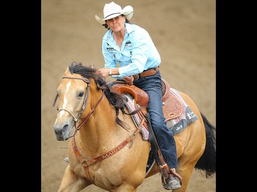 Barrel Racing Champion Lisa Lockhart, of Oelrichs, South Dakota, sailed around the barrels in a time of 91.5 seconds in the barrel-racing event during Championship Sunday at the 2019 Calgary Stampede rodeo on Sunday, July 14, 2019. Al Charest / Postmedia
