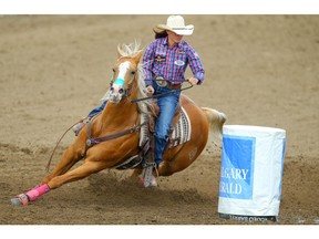 Cowgirl Ivy Conrado of Hudson, CO, sailed around the barrels in a time of 17.01 seconds during barrel-racing action at the Calgary Stampede rodeo on Monday, July 8, 2019. Al Charest / Postmedia