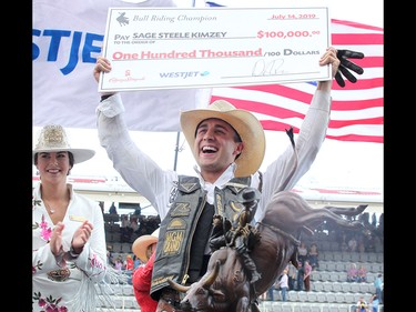 Sage Steele Kimzey won the Bull Riding final in the Stampede Rodeo at the Calgary Stampede in Calgary, Ab on Sunday, July 14, 2019. Brendan Miller/Postmedia