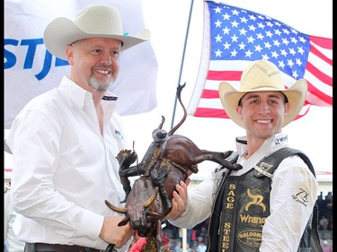 Sage Steele Kimzey won the Bull Riding final in the Stampede Rodeo at the Calgary Stampede in Calgary, Ab on Sunday, July 14, 2019. Brendan Miller/Postmedia