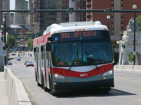 A Calgary Transit bus crosses the Centre Street bridge in Calgary Monday, July 29, 2019.