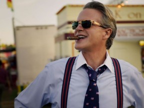 Cary Elwes, who plays Mayor Kline, smokes a cigar in Stranger Things. (Netflix)