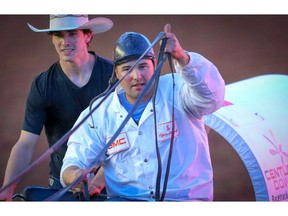 Logan Gorst / Century Downs Racetrack and Casino celebrates wins the 2019 GMC Rangeland Derby championship at Stampede Park in Calgary on Sunday, July 14, 2019. Al Charest / Postmedia