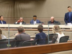 Coun Jeromy Farkas (R) asks questions at City Council Tuesday, July 30, 2019. Calgary City Council agreed to proceed with an arena deal. Jim Wells/Postmedia