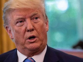 U.S. President Donald Trump speaks to the press after signing a bill for border funding legislation in the Oval Office at the White House in Washington, D.C., on Monday, July 1, 2019.