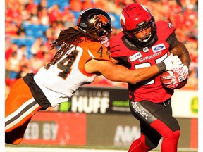 Running Back Don Jackson evades a tackles by Lions DB Isaiah Guzylak-Messam during the 4th quarter as Calgary Stampeders beat BC Lions 36-32 at McMahon Stadium during week 3 of CFL action. Saturday, June 29, 2019. Brendan Miller/Postmedia