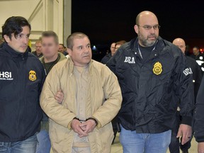 This file photo handout by the US Department of Justice received February 19, 2019, shows Mexican drug baron Joaquin "El Chapo" Guzman as he was extradited to the United States to face charges. (HO/AFP/Getty Images)