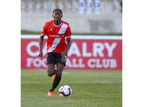 Cavalry FC Malyk Hamilton moves the ball upfield during Canadian Premier League Canadian Chamionship soccer action between Pacific FC and Cavalry FC at ATCO Field at Spruce Meadows in Calgary on Wednesday, May 22, 2019. Jim Wells/Postmedia