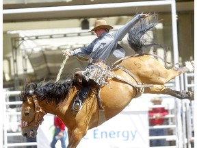 Dawson Hay from Wildwood, AB, was the day winner of the Saddle Bronc event on day 6 of the 2019 Calgary Stampede rodeo in Calgary on Wednesday, July 10, 2019. Darren Makowichuk/Postmedia