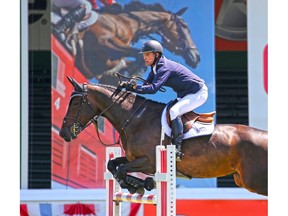 American Charlie Jacobs rides Est Di Palatina in the Friends of the Meadows Cup as the North American show jumping event got under away in Calgary on Wednesday July 3, 2019. Jacobs is the CEO of the Boston Bruins.
Gavin Young/Postmedia