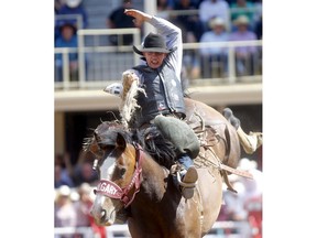 Kolby Wanchuk from Sherwood Park, AB, was the day winner for the Saddle Bronc event on day 7 of the 2019 Calgary Stampede rodeo Calgary on Thursday, July 11, 2019. Darren Makowichuk/Postmedia