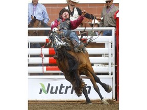 Wyatt Denny from Minden, NV, was the day winner of the Bareback event on day 6 of the 2019 Calgary Stampede rodeo in Calgary on Wednesday, July 10, 2019. Darren Makowichuk/Postmedia