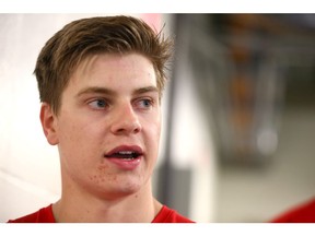 Jeremy McKenna speaks to media following an on ice session during the Calgary Flames development camp at Winsport in Calgary on Thursday, July 4, 2019. Jim Wells/Postmedia