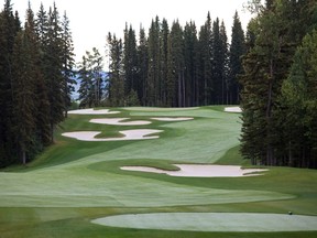 Hole 8 of Wes Gilbertson's Awesome 18, an intimidating uphill Par-5 on the Hawk Course at Priddis Greens Golf & Country Club. This sandy assignment stretches from 383 to 540 yards.