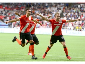 Cavalry FC star Dominick Zator (L) celebrates his game-winning, second-half goal during third-round CPL Canadian Championship soccer action between Cavalry FC and the Vancouver Whitecaps at BC Place in Vancouver, B.C. Wednesday, July 24, 2019. Jim Wells/Postmedia