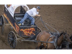 Logan Gorst lead start to finish to win Heat 9 of the Rangeland Derby chuckwagon races at the Calgary Stampede on Saturday. Photo by Mike Drew/Postmedia.