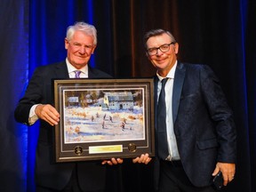 Theo Fleury was inducted into the Alberta Hockey Hall of Fame on Sunday.