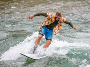 Jacob Kelly Quimlan surfs on the Bow River during the Slam Festival in Calgary on Saturday.