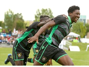 Calgary Foothills FC Aribim Pepple celebrates the team's first goal of the game against Victoria Highlanders in USL2 soccer action at Mount Royal University in Calgary on Sunday, July 14, 2019. Jim Wells/Postmedia
