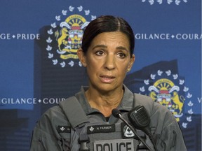 Insp. Nancy Farmer with the Calgary Police Service Support Section updates media after a police dog bit and seriously injured the son of a dog handler at the handler's home over the weekend.