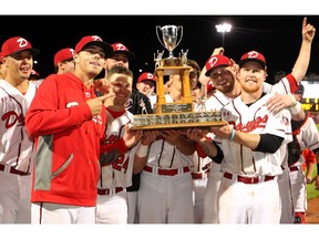 The Okotoks Dawgs celebrate as they win Game #2 of the WCBL Final Series against the Regina Red Sox 8-6 to take the championship. The Dawgs last won the WCBL Championship ten years ago in 2009. Friday, August 16, 2019. Brendan Miller/Postmedia