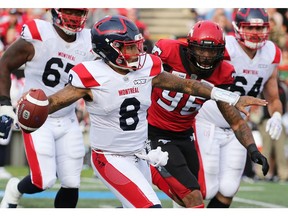 The Calgary Stampeders' Chris Casher has his sights on Montreal Alouettes QB Vernon Adams Jr. during CFL action in Calgary on Saturday August 17, 2019. The Alouettes won 40-34. Gavin Young/Postmedia