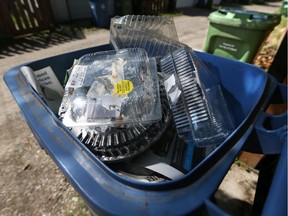 Clamshell plastic packaging is not easily recycled in Calgary's blue bin system and several thousand tons are in limbo as the city decides how to dispose of the material.