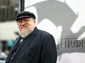 In this March 18, 2013 file photo, author George R.R. Martin arrives at the premiere for the third season of the HBO television series "Game of Thrones" at the TCL Chinese Theatre in Los Angeles.