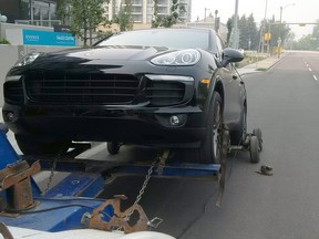 One of the vehicles recovered in a year-long fraud investigation by Calgary police. Two men face multiple charges.
