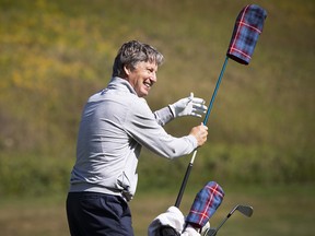 Brandel Chamblee hits balls on the driving range during a practice day at the Shaw Charity Classic on Tuesday, Aug. 27, 2019.