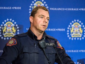Const. Dennis Smithson speaks to media about suspicious substances found in a green space at Evanston Square N.W. in Calgary.