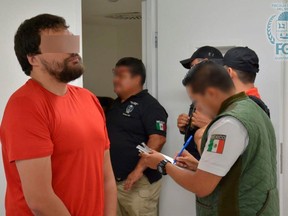 Dylan John Bennett, 22, is seen after he was arrested by Mexican police officers, in the beach resort city of Cancun, in this photo delivered to Reuters on Sunday, Aug. 25, 2019.