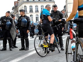 French gendarmes stand guard next to movable barriers and check people at the entrance of the Vieux Bayonne district France on August 24, 2019. (THOMAS SAMSON/AFP/Getty Images)