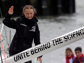 Swedish climate activist Greta Thunberg, 16, arrives in the US after a 15-day journey crossing the Atlantic in the Malizia II, a zero-carbon yacht, on August 28, 2019 in New York. - "Land!! The lights of Long Island and New York City ahead," she tweeted early Wednesday. She later wrote on Twitter that her yacht had anchored off the entertainment district of Coney Island in Brooklyn to clear customs and immigration.