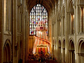 A large helter skelter is installed inside Norwich Cathedral, in Norwich, England as part of the "Seeing It Differently" project which aims to give people the chance to experience the cathedral in an entirely new way and open up conversations about faith, Thursday Aug. 8, 2019.