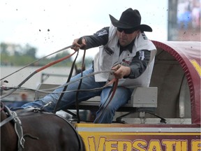 Kurt Bensmiller is seen around barrel 1 at the start the Dash for Cash $50,000 heat at the WPCA World Championships at Century Downs Racetrack & Casino. Bensmiller won the event and will take home $25,000. The rest will be spilt between the other three chuckwagon drivers. Sunday, August 25, 2019. Brendan Miller/Postmedia