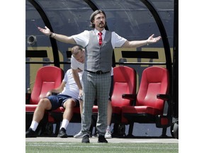 Cavalry FC coach/ GM Tommy Wheeldon Jr gestures on the sideline during CPL action against Valour FC in Winnipeg at IG Field on July 27, 2019. James Carey Lauder/CPL