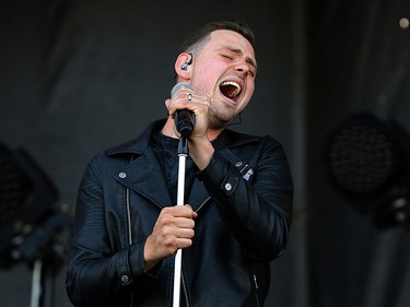 Lead vocalist Ty Hunter of the Hunter Brothers perform on the second day of the Country Thunder music festival, held at Prairie Winds Park in Calgary Saturday, August 17, 2019. Dean Pilling/Postmedia