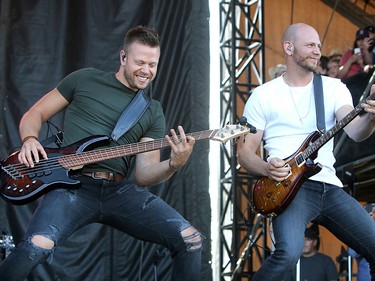 Bassist Luke Hunter and Guitarist Brock Hunter of the Hunter Brothers perform on the second day of the Country Thunder music festival, held at Prairie Winds Park in Calgary Saturday, August 17, 2019. Dean Pilling/Postmedia