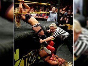 Natalya vs. Charlotte Flair in the very first NXT TakeOver for the NXT Women’s Championship. (WWE Photo)