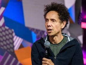Journalist and best-selling author Malcolm Gladwell speaks at the Energy Disruptors conference on Wednesday.