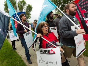 Alberta Union of Provincial Employees (AUPE) members held an information picket outside of Leduc Community Hospital to rally against the UCP government's Bill 9 in Leduc, on Tuesday, July 9, 2019.