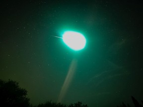 A suspected meteor lights up the night sky above Elk Island National Park on August 31, 2019.