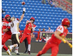 Dinos qauarterback Adam Sinagra makes a pass during the second half of action as the U of C Dino's beat the University of Manitoba Bisions 24-10 at McMahon Stadium on Friday, September 6, 2019. Brendan Miller/Postmedia