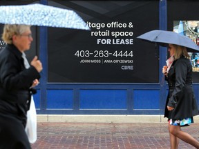 For lease signs advertise space along Stephen Avenue Mall in downtown Calgary on Tuesday September 10, 2019. A report from ATB financial shows sluggish growth in Alberta for 2019.