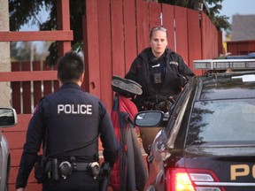 Calgary police investigate a stabbing in the 200 block of Pensville Close on Sept. 19, 2019. One man was rushed to hospital in life-threatening condition.