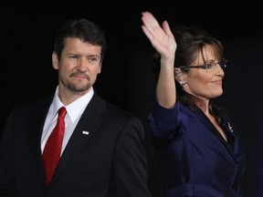 Vice-presidential nominee Alaska Gov. Sarah Palin and husband Todd Palin walk out on stage during the election night rally at the Arizona Biltmore Resort & Spa on Nov. 4, 2008 in Phoenix, Ariz. (David McNew/Getty Images)