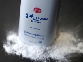 In this photo illustration, a container of Johnson's baby powder sits on a table. A new class action lawsuit alleges a link between the powder and ovarian cancer.